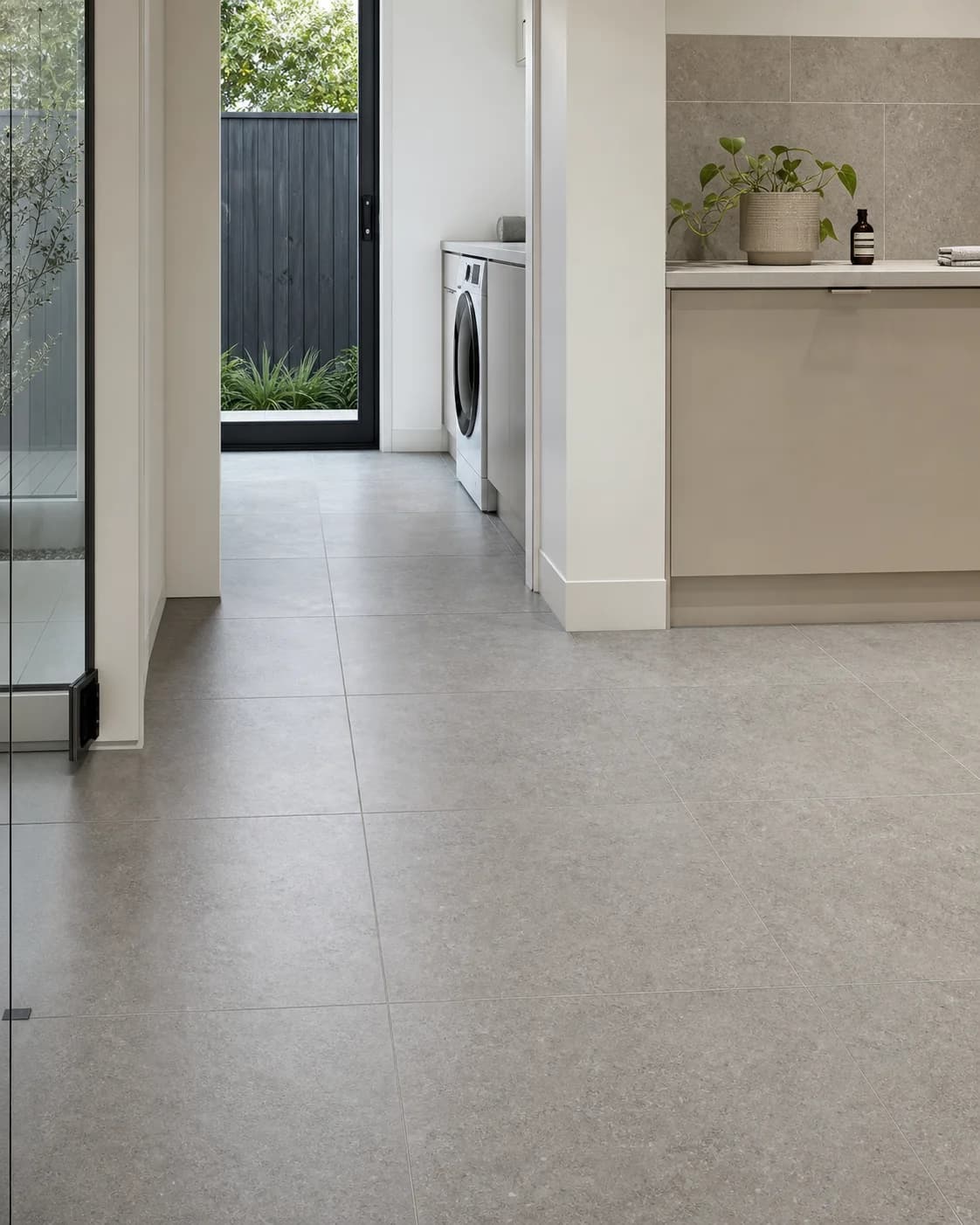 Large-format floor tiles installed through a modern Melbourne home